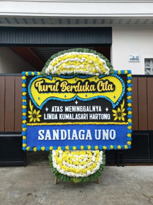 Papan Bunga Duka di Juhar